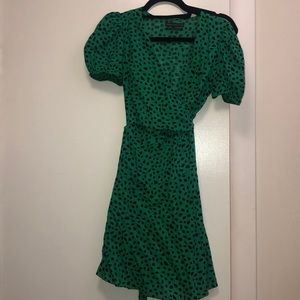 Green and black short puff sleeved wrap dress